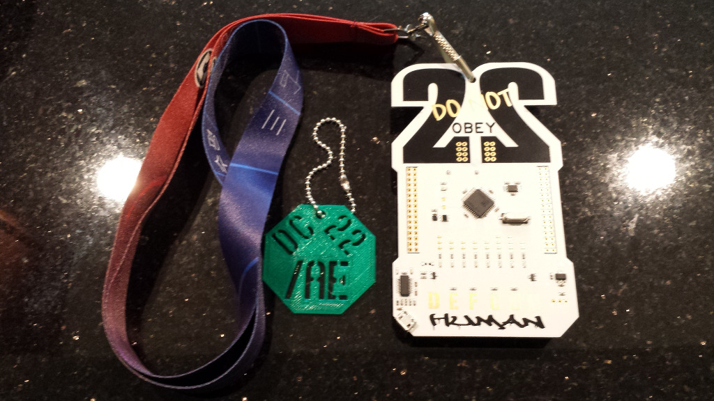 Defcon 22 badge and /AE token